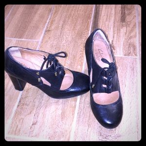 Clark’s black leather heels